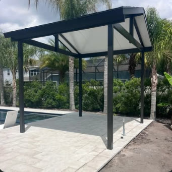 Aluminium carport-style cover on dark posts next to a pool